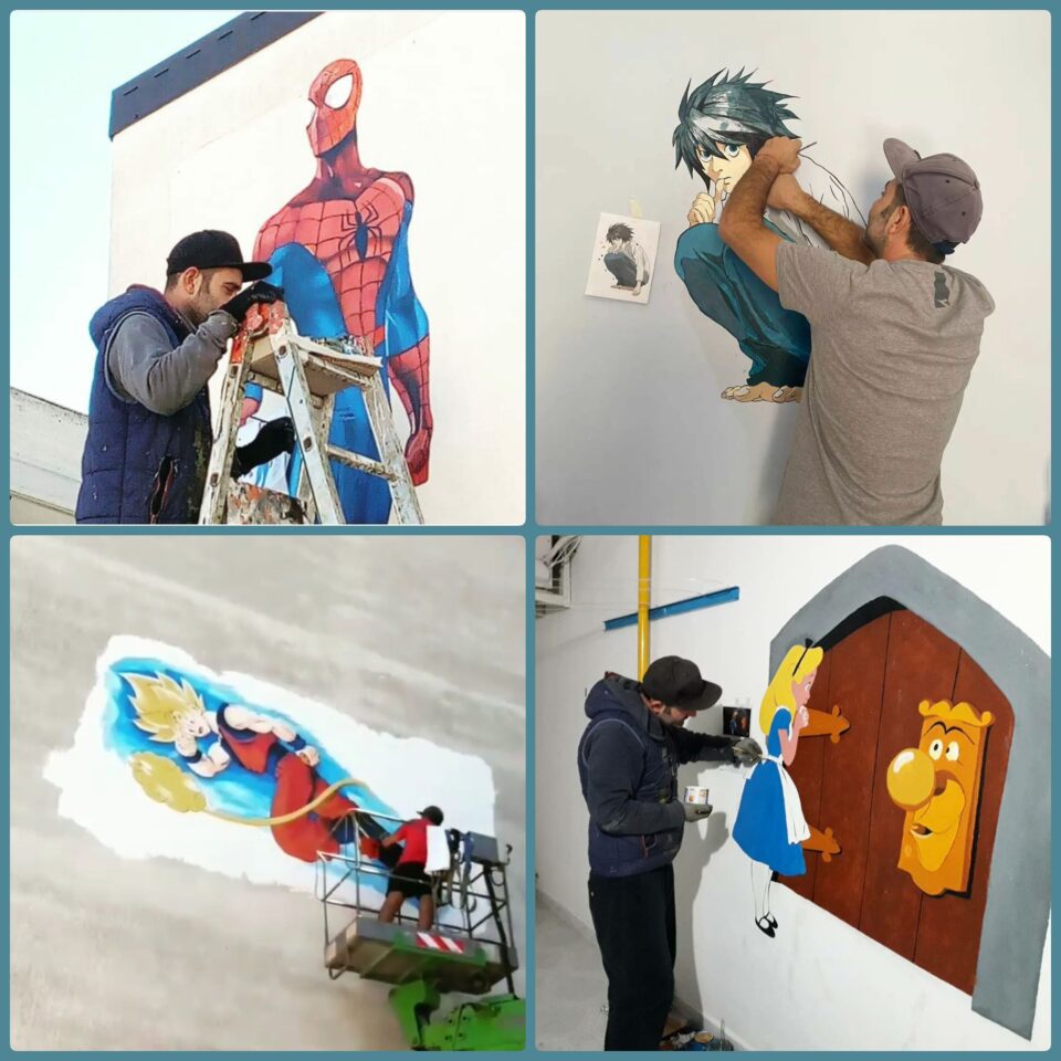 Paolo Carriere all'opera con alcuni dei suoi murales